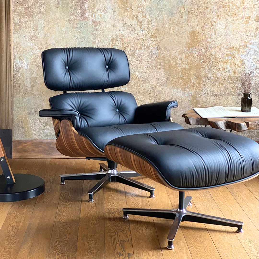 poltrona charles eames com puff